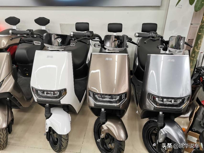 雅迪最新电动车款,家庭温馨出游的使者